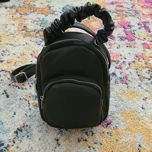 Wide Fable purse/mini backpack.